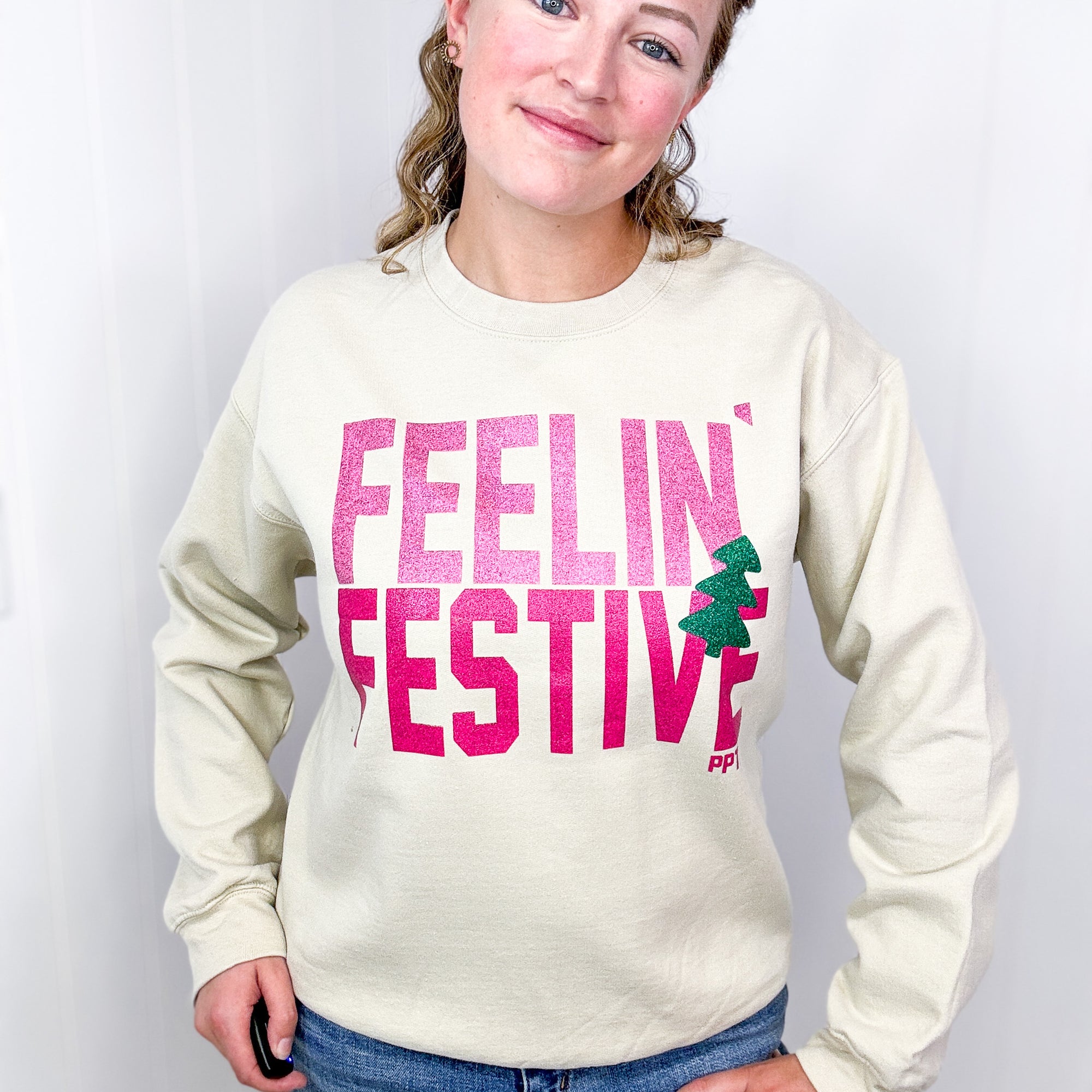 Glitter Feelin' Festive on Tan Graphic Fleece Long Sleeve Sweatshirt