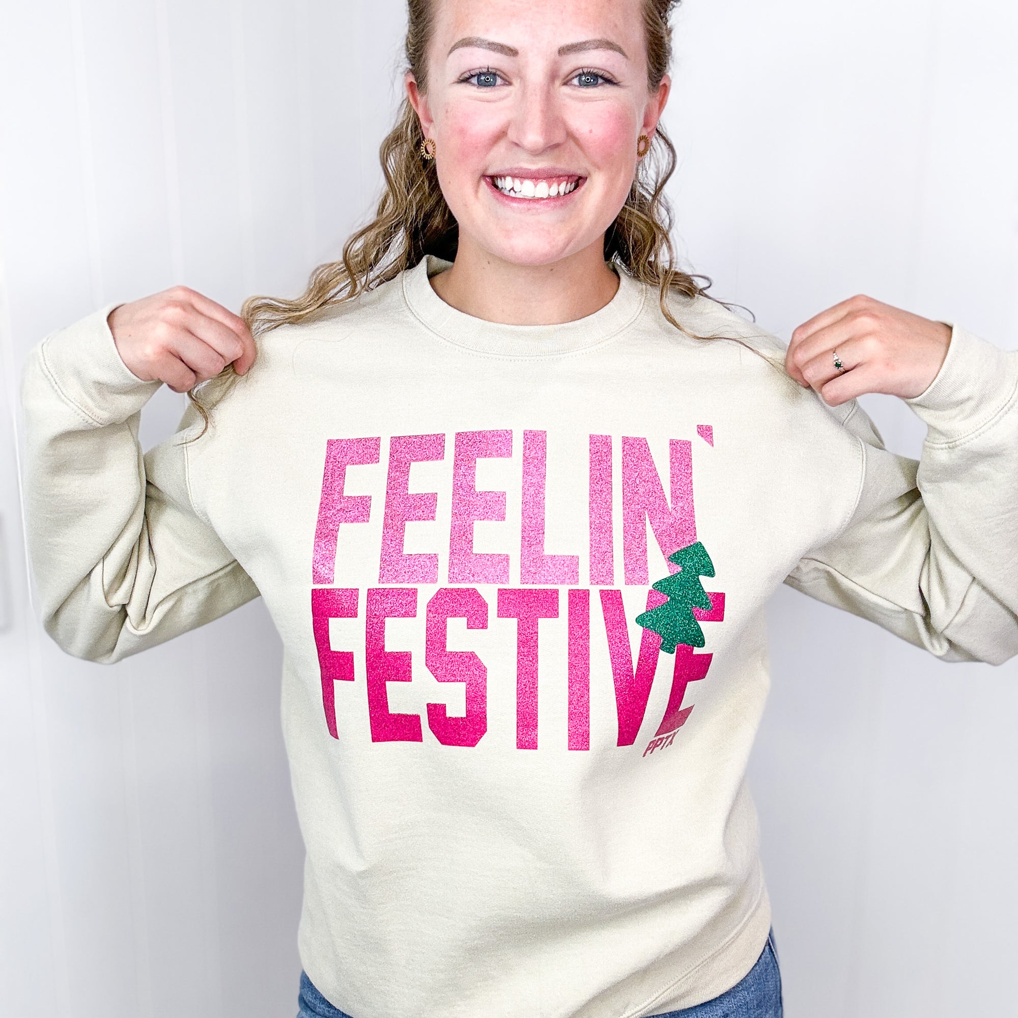 Glitter Feelin' Festive on Tan Graphic Fleece Long Sleeve Sweatshirt