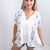 POL Ivory Purple Floral Accent Short Sleeve Top - Boujee Boutique 